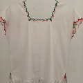 Blusa tapizada en bordado